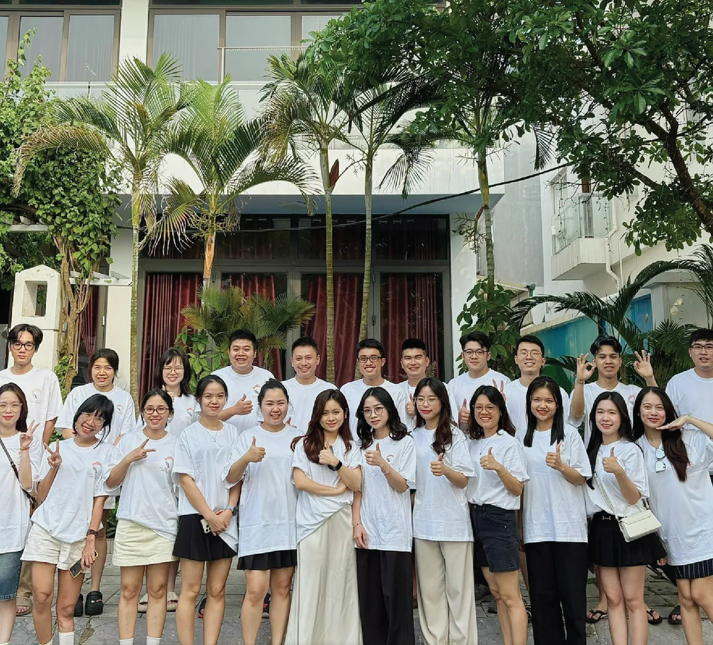 The HAM Global team in front of the company office in Vietnam